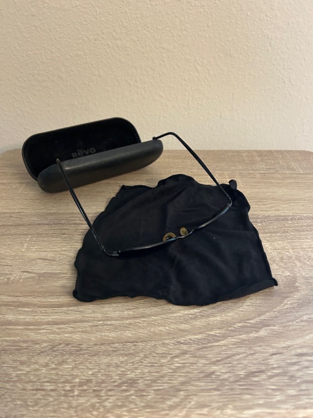Revo Black Rim Sunglasses with polarized blue reflective Lenses
No scratches